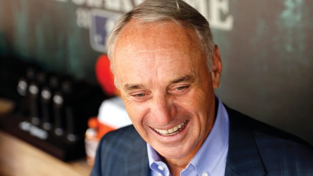 MLB commissioner Rob Manfred talks to the media